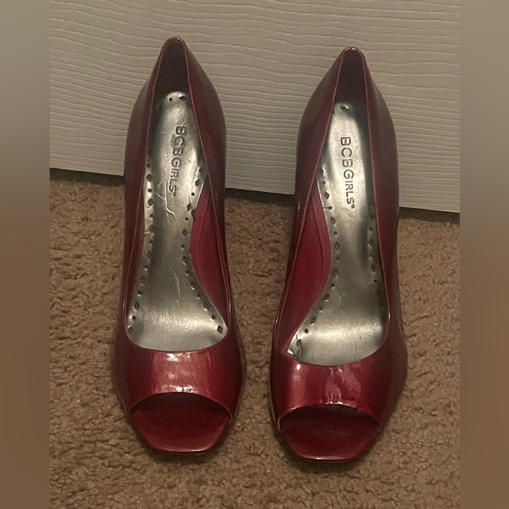 Lightly used burgundy opened pump. Size 8.5 4 inch heel